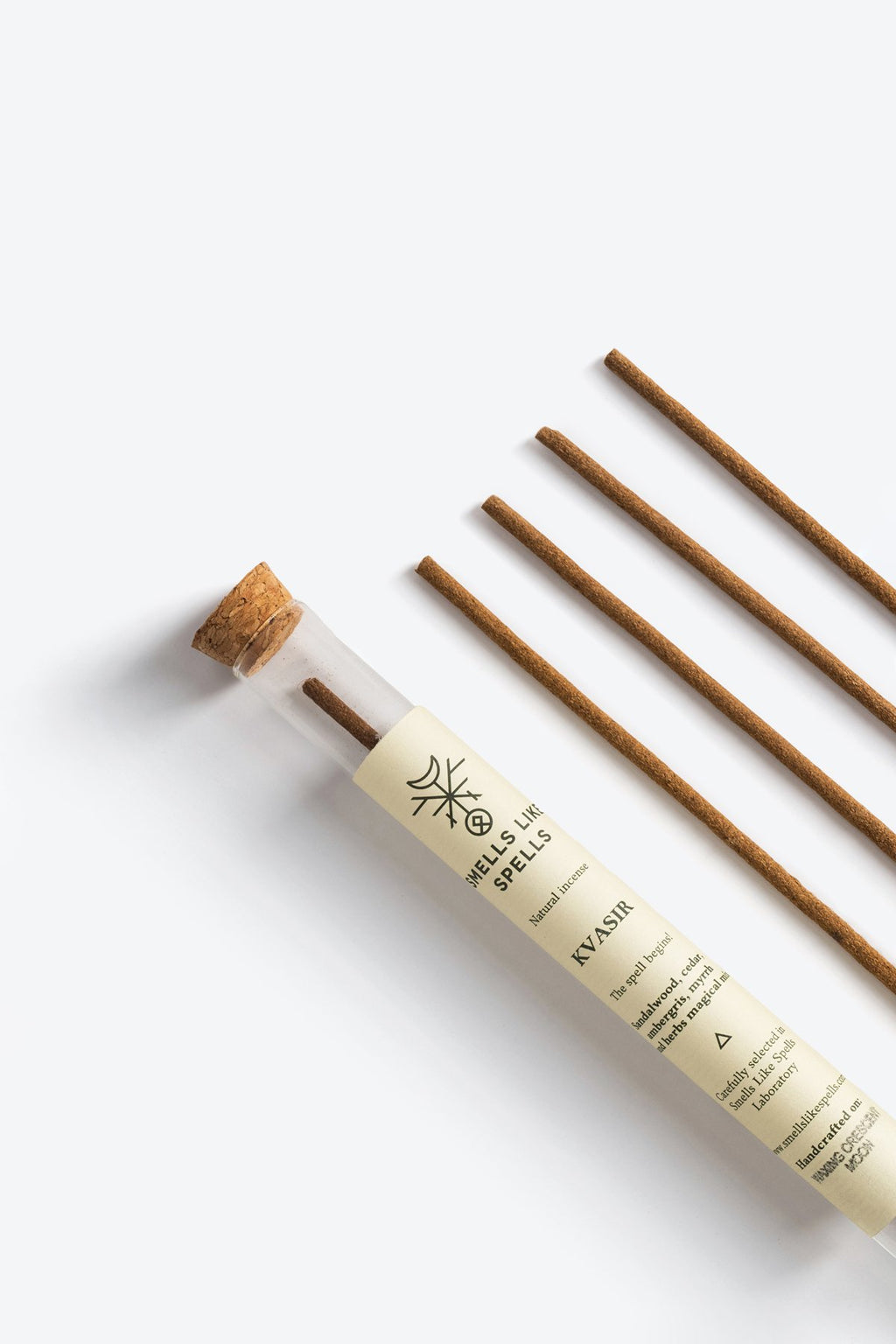 3. Close-up of Smells Like Spells Natural Incense KVASIR, featuring cork-topped glass tube and incense sticks