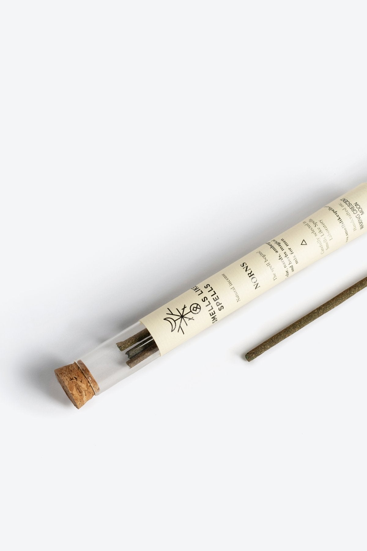 2. Close-up of Smells Like Spells Natural Incense NORNS for men, highlighting packaging and incense stick
