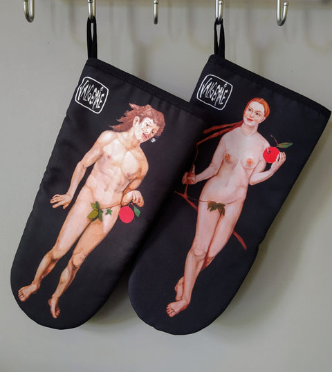 4. Pair of Katrin Valgemäe oven gloves with Adam and Eve prints hanging on hooks