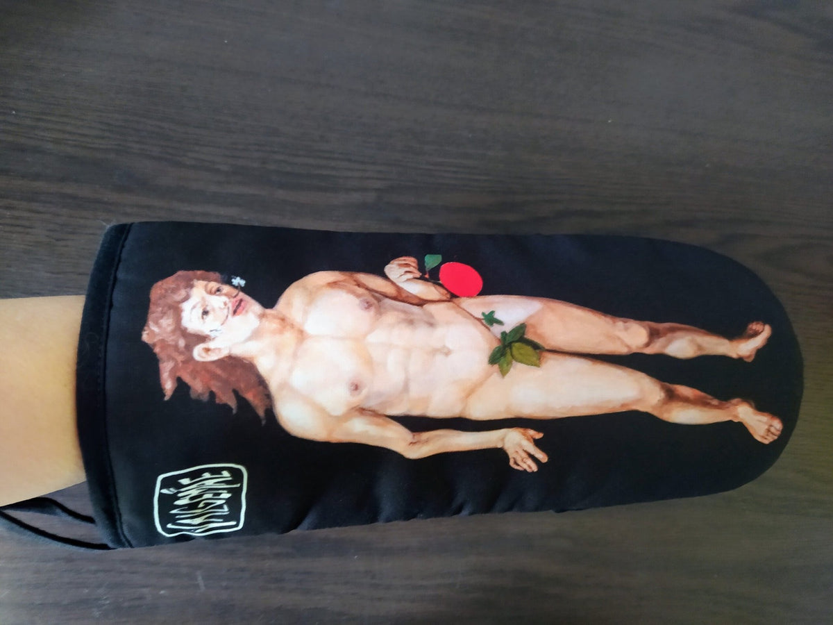 3. Close-up of Katrin Valgemäe oven glove on arm, showing Dürer's Adam print and logo