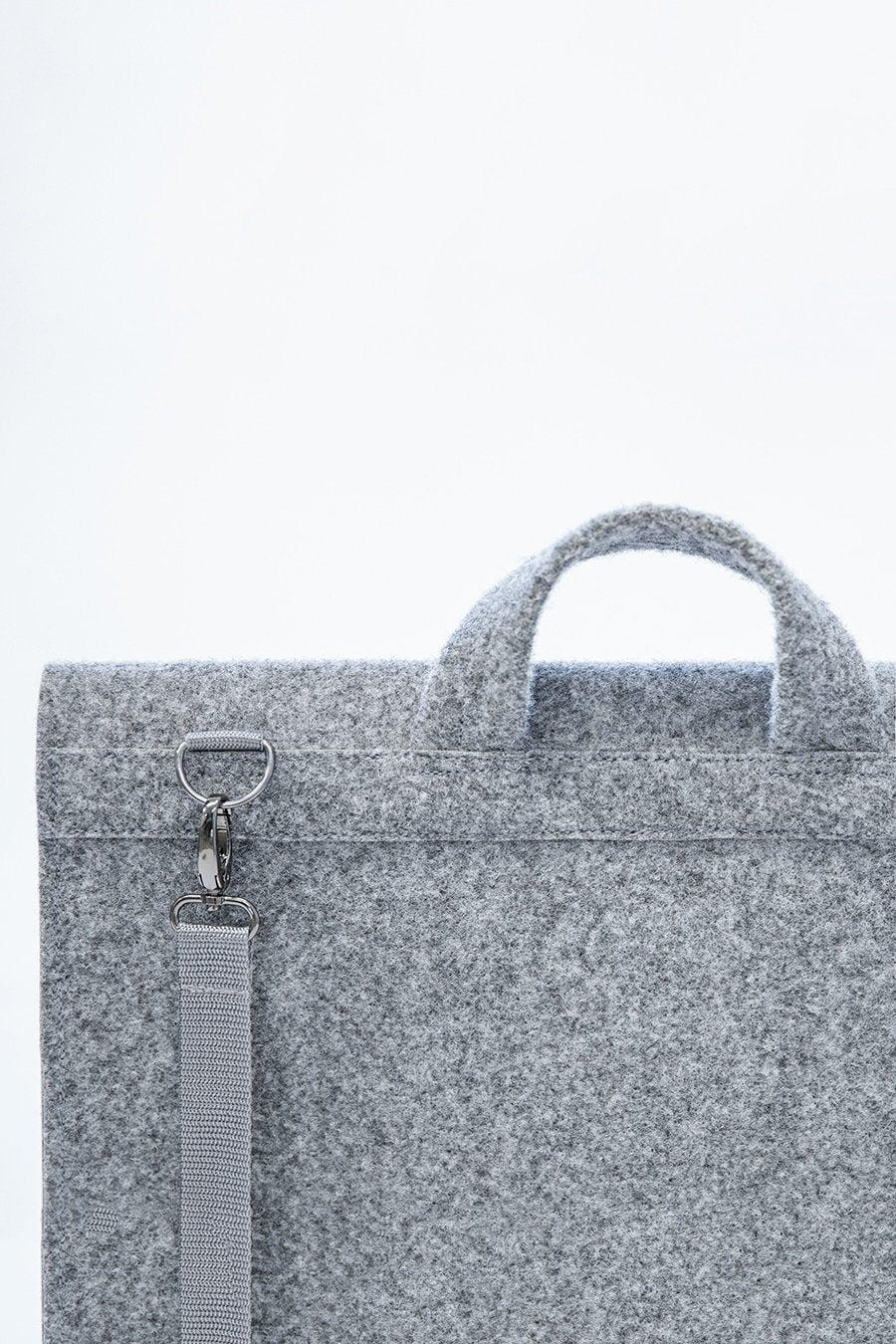 7. Detail of grey Nordhale Briefcase Hjo handle and strap attachment