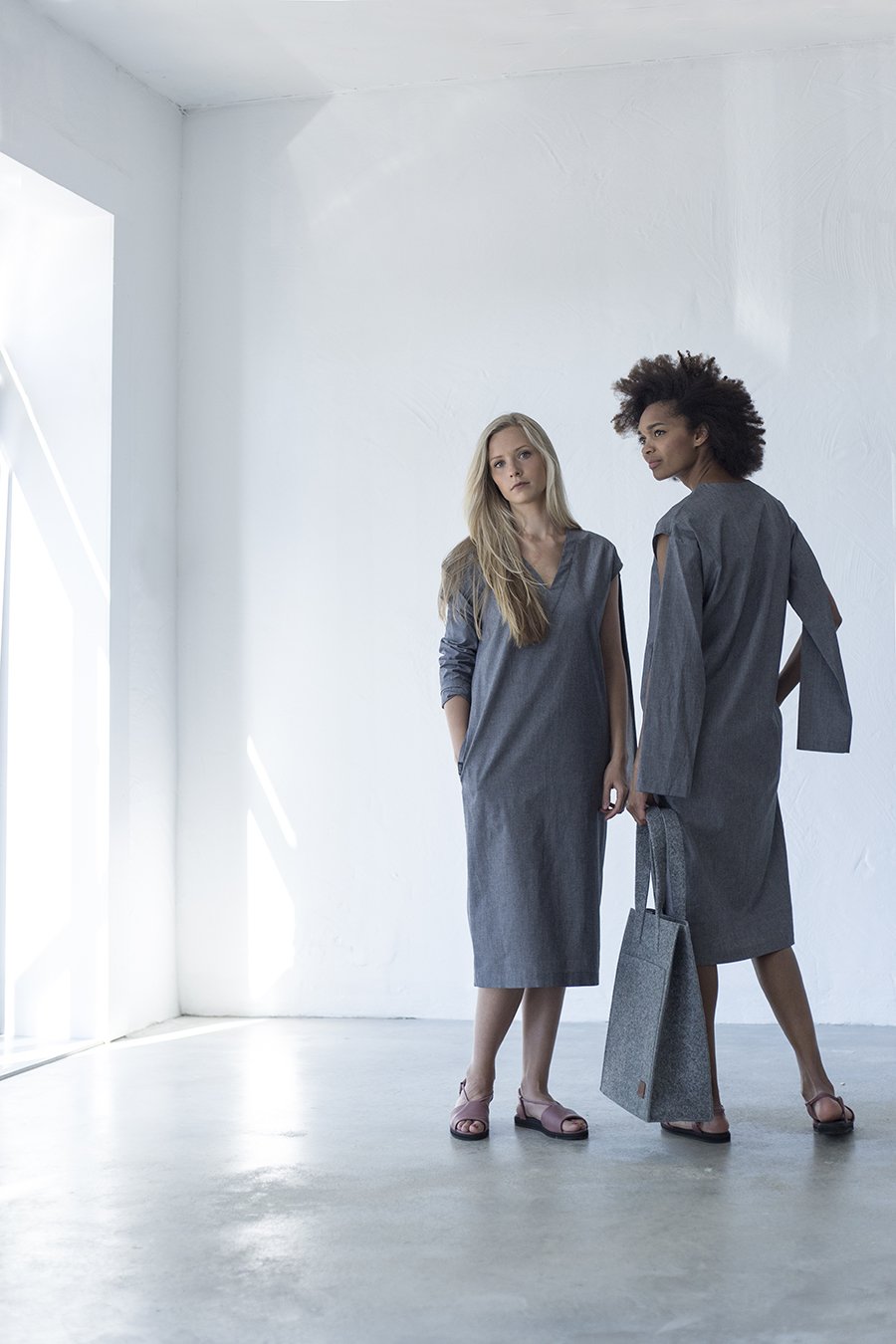 1. Women's grey Hof Tote Bag by Nordhale, styled with minimalist dresses in a lifestyle setting