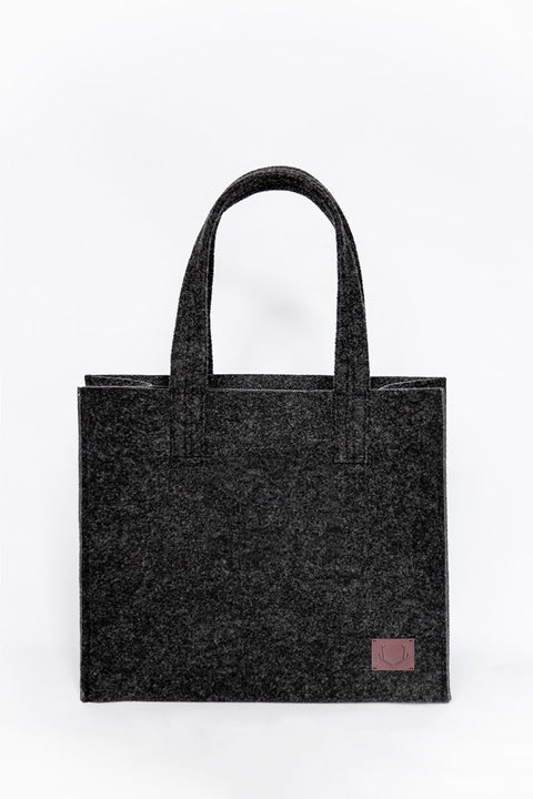 5. Studio shot of unisex black Office Bag Holm by Nordhale, featuring durable recycled PET felt material