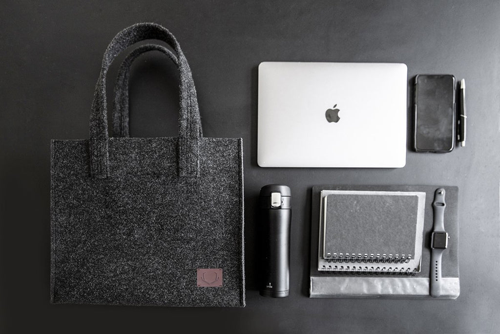 2. Unisex black Office Bag Holm by Nordhale with laptop, notebook, and accessories, highlighting spacious interior and functionality