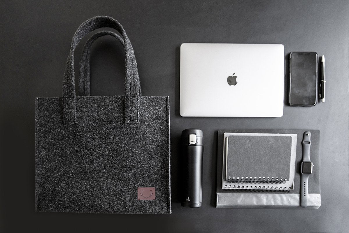 2. Unisex black Office Bag Holm by Nordhale with laptop, notebook, and accessories, highlighting spacious interior and functionality