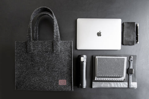 2. Unisex black Office Bag Holm by Nordhale with laptop, notebook, and accessories, highlighting spacious interior and functionality