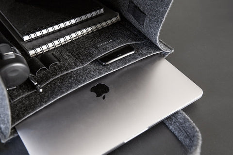 3. Close-up of black Office Bag Holm by Nordhale, showing interior with laptop pocket and pen slots