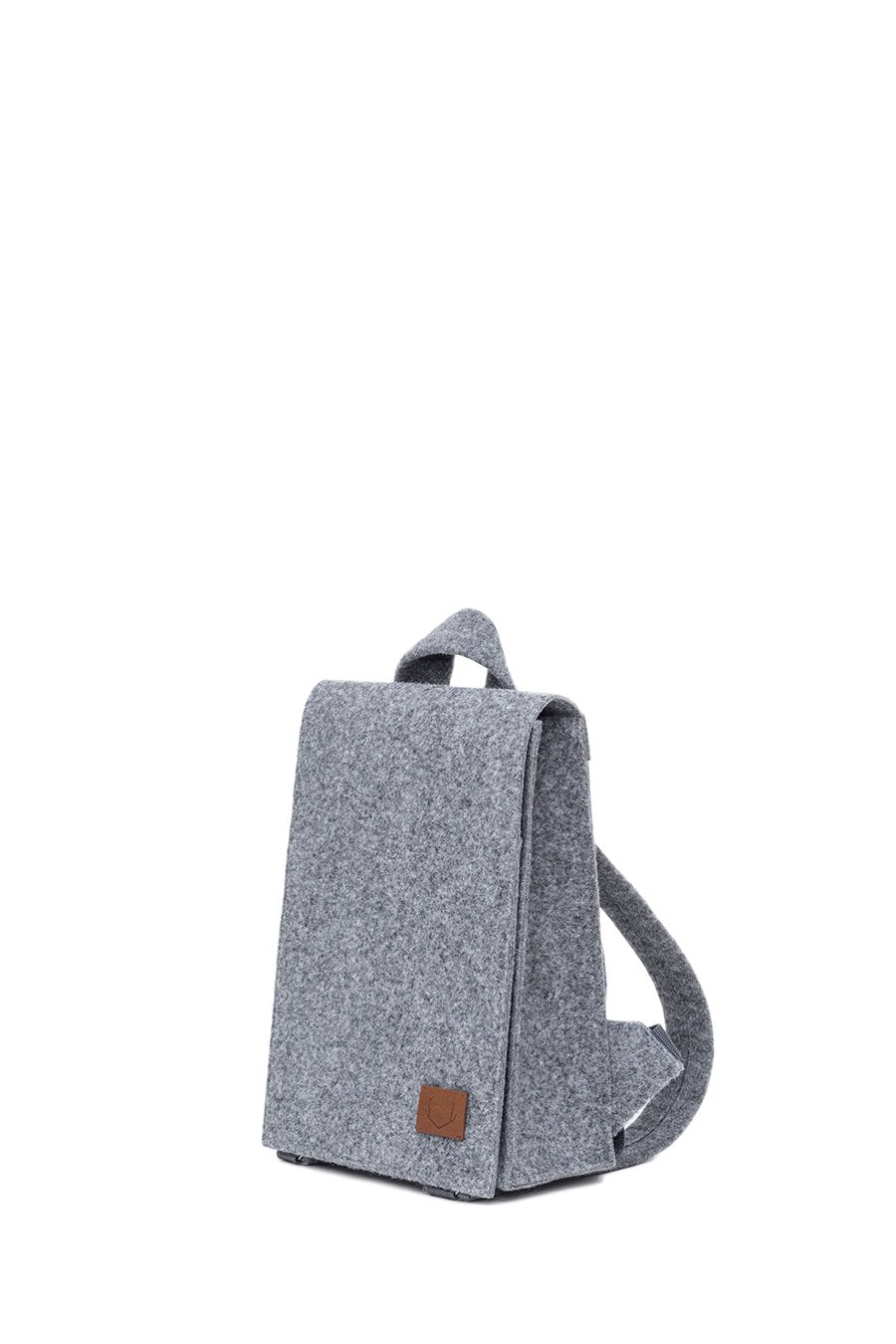 5. Studio image of Nordhale Lund Mini Backpack in grey, side angle showing structure