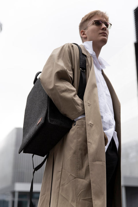 2. Unisex black Nordhale Backpack Lund worn by male model in cityscape