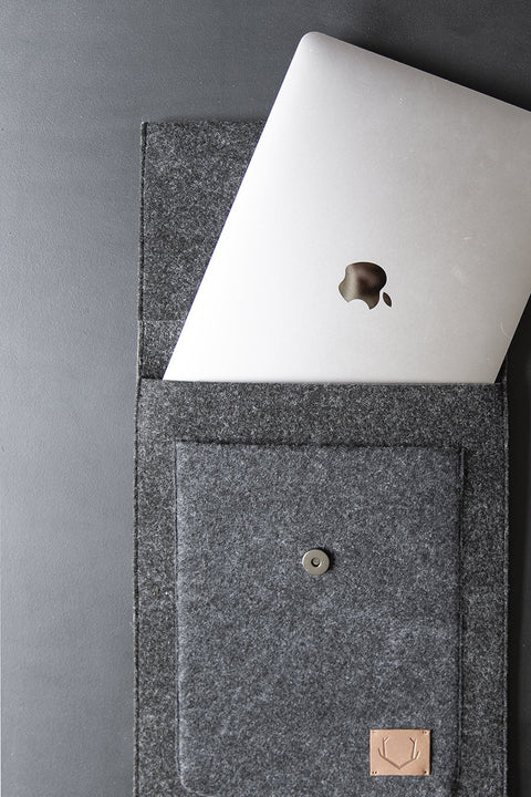 5. Open Nordhale Malmö Laptop Sleeve with MacBook partially inside, showcasing interior design