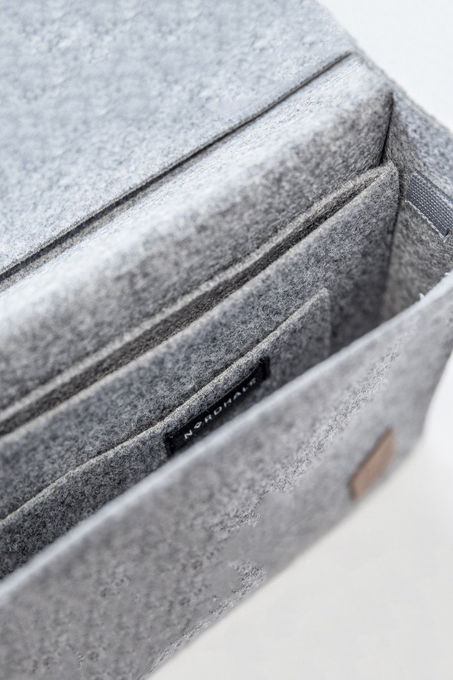 7. Close-up of Nordhale grey Briefcase Sören magnetic snap closure, showcasing secure design