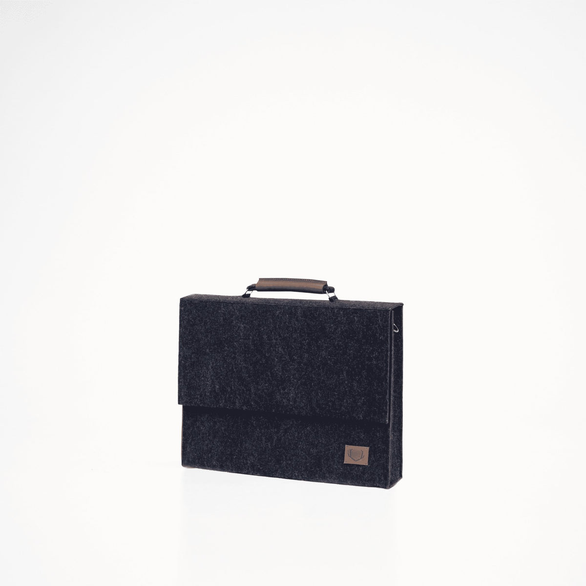 3. Black Nordhale Briefcase Sören shown in studio with front flap and handle