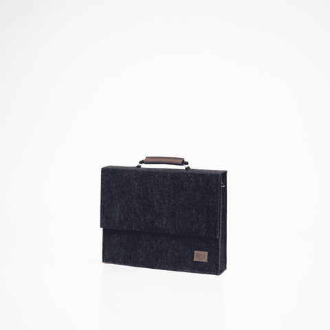 3. Black Nordhale Briefcase Sören shown in studio with front flap and handle