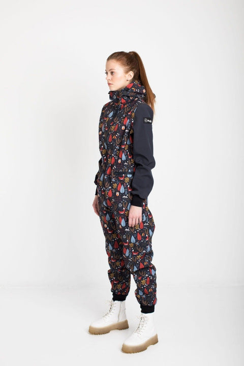 3. Women's EBEKAI softshell overall by Nuckö, shown in profile with breathable material and velcro strip