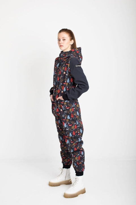 2. Side view of women's EBEKAI softshell overall by Nuckö, highlighting waterproof fabric and elastic waist