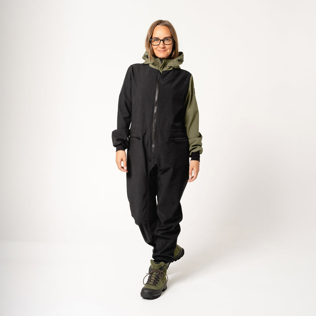 3. Women's CAROLA softshell overall by Nuckö in black and green, front view in studio