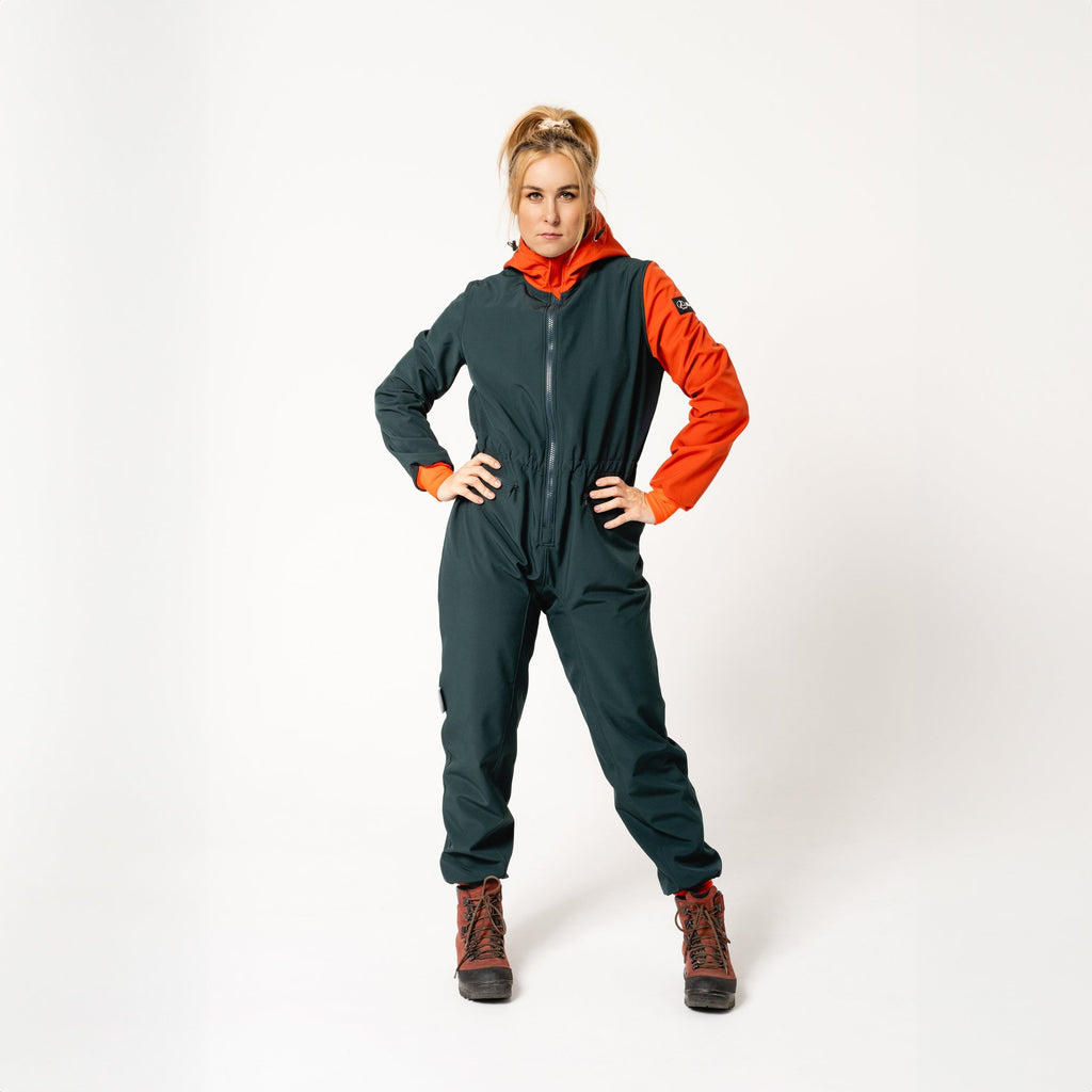 3. Women's Kristel softshell overall by Nuckö in dark green and orange, full front view in studio