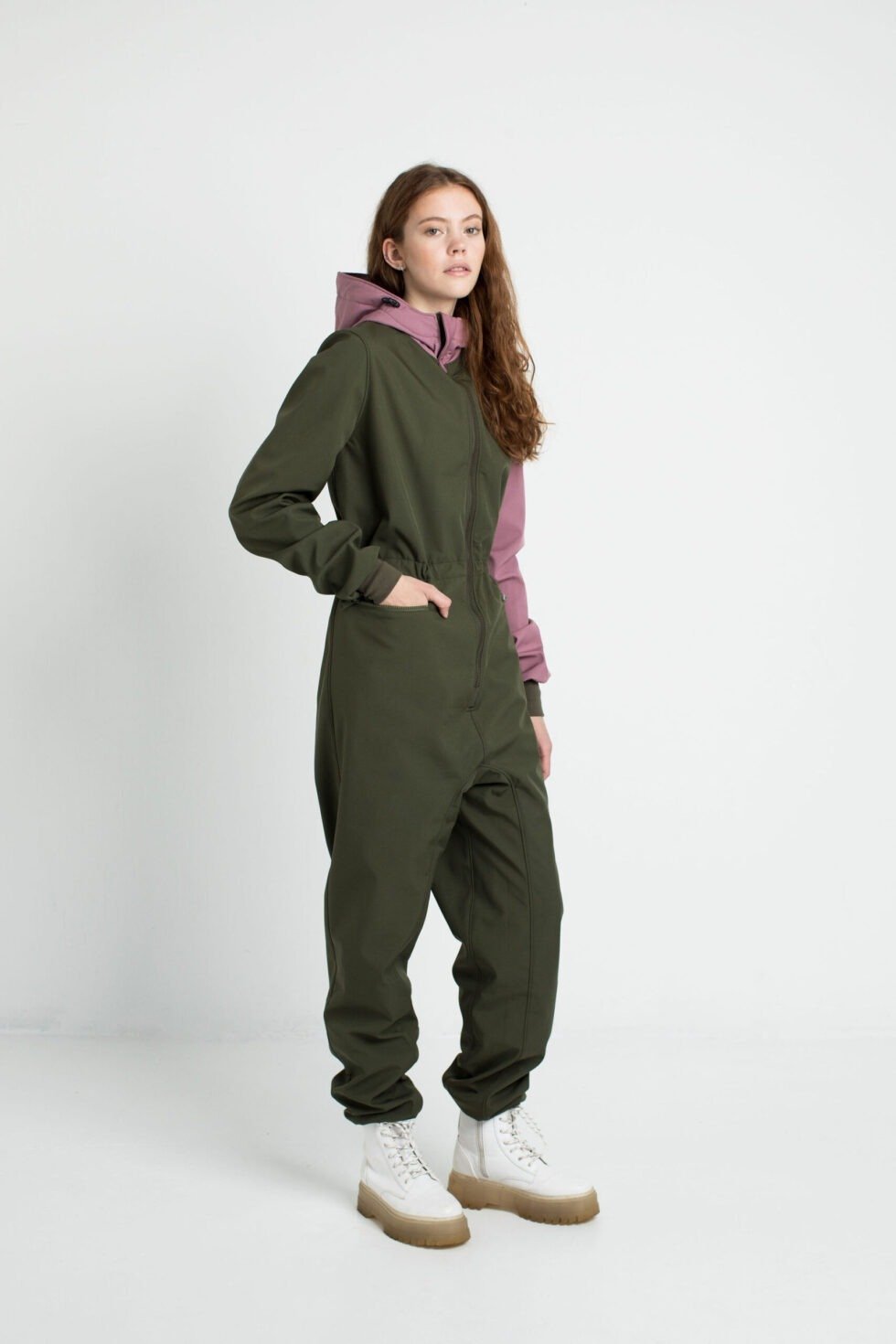 3. Women's KERTTU softshell overall by Nuckö in green and pink, front view in studio