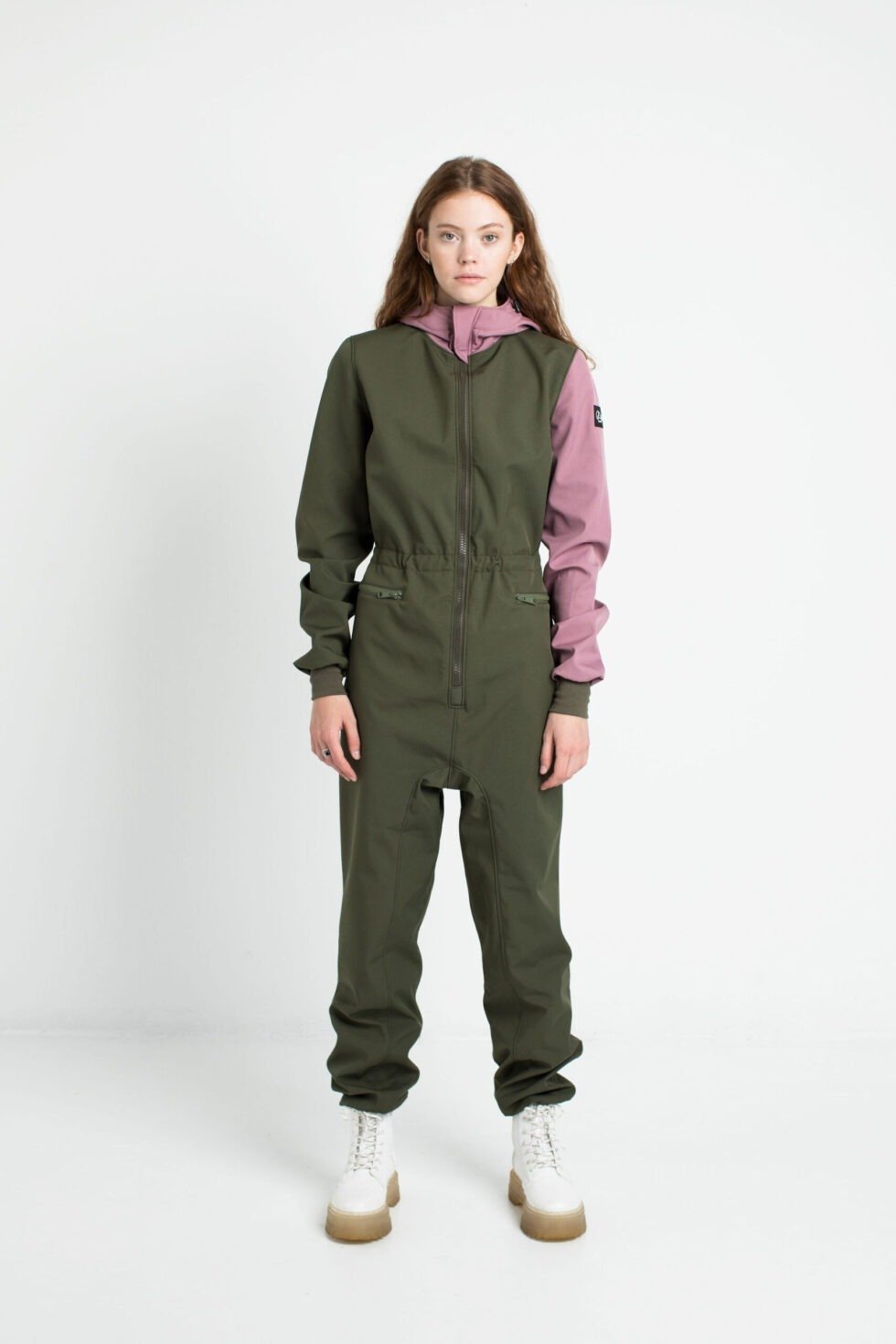 1. Women's KERTTU softshell overall by Nuckö in green and pink, shown in studio setting