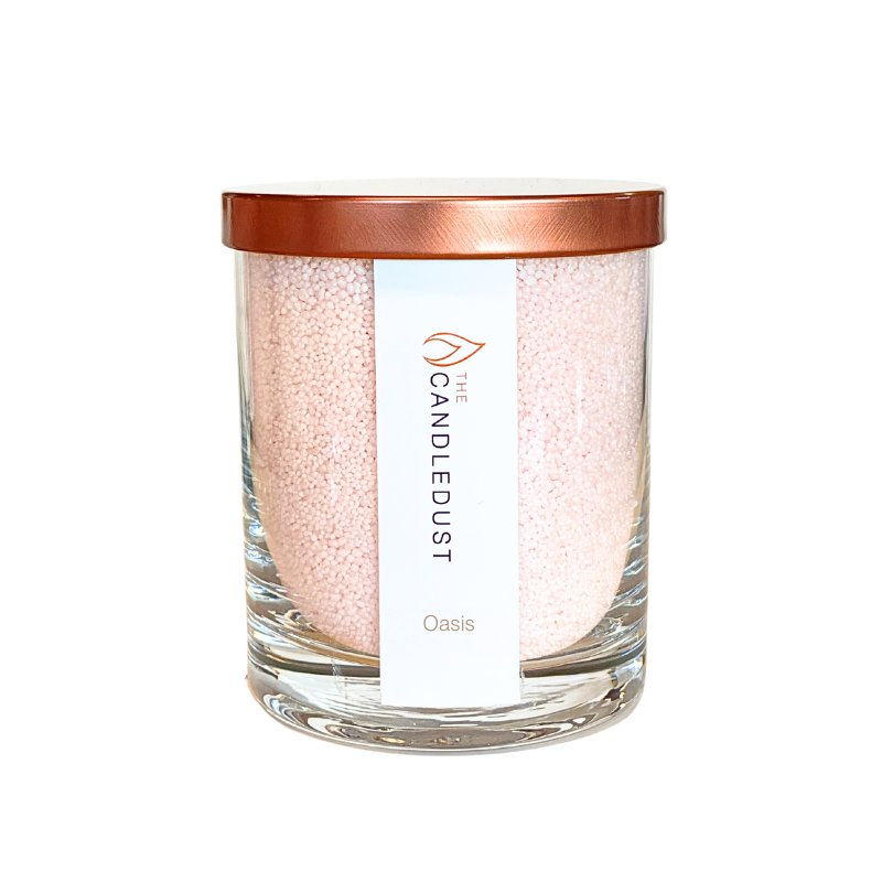 4. Studio shot of Candledust Powdered Candle in Glass - Oasis with rose gold lid and label