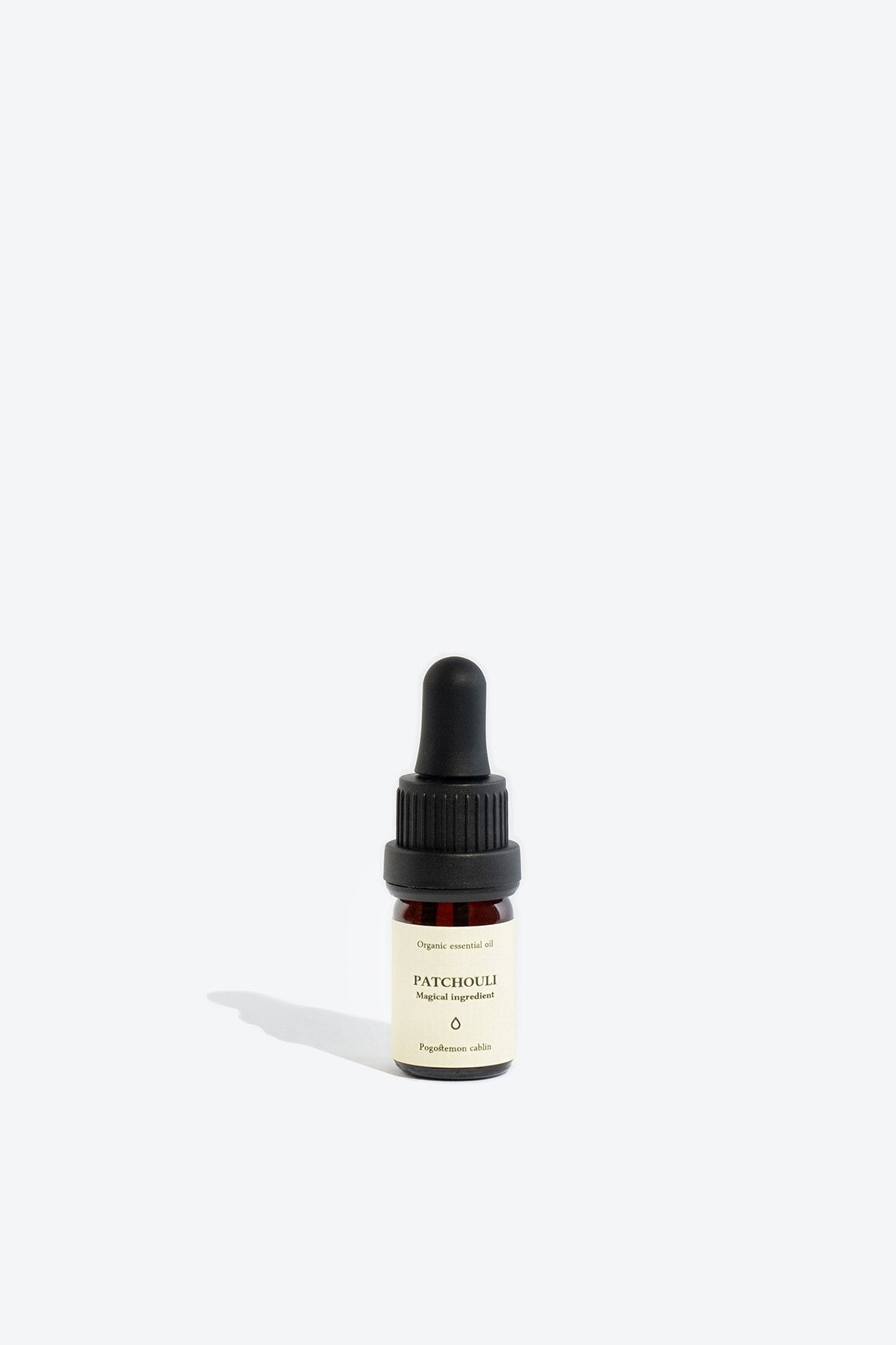 1. Smells Like Spells PATCHOULI Essential Oil in 5 ml glass bottle with pipette, studio shot