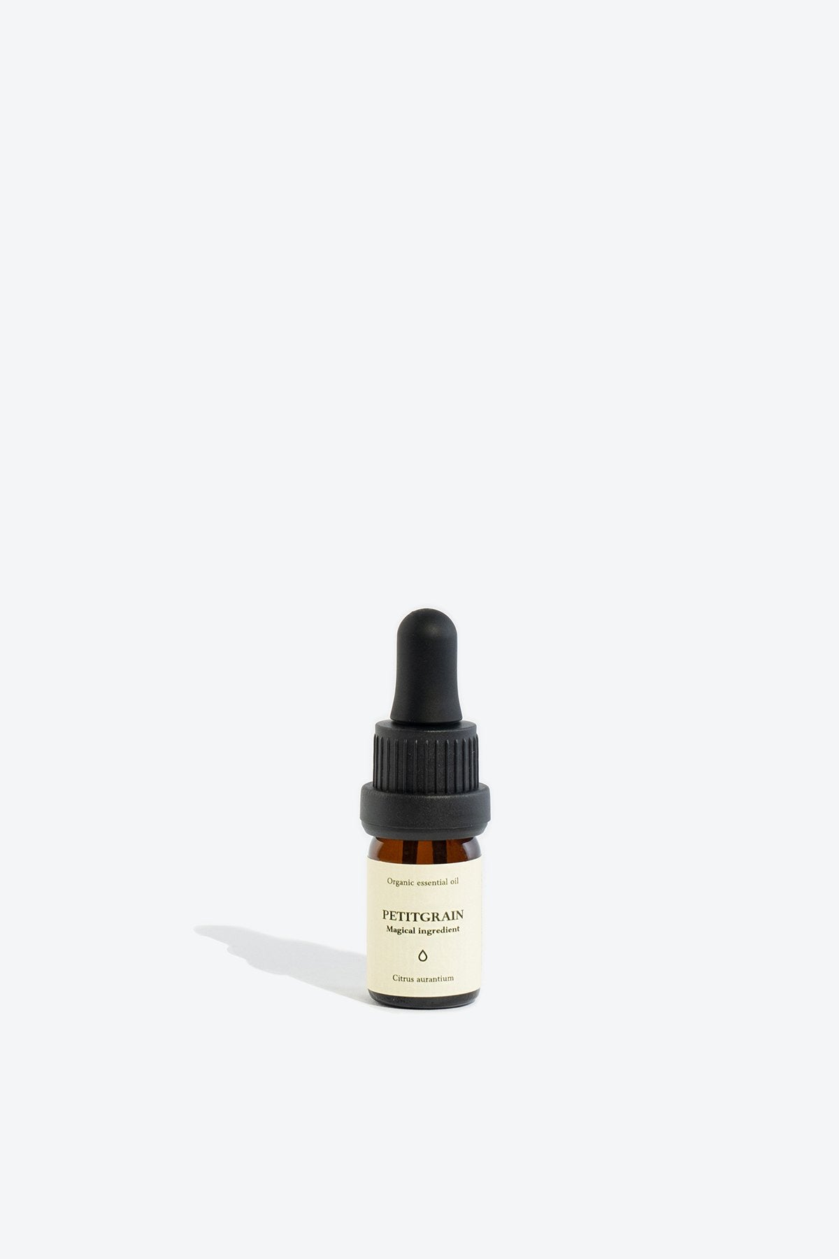 3. Smells Like Spells PETITGRAIN Essential Oil 5 ml bottle with glass pipette, shown in studio setting