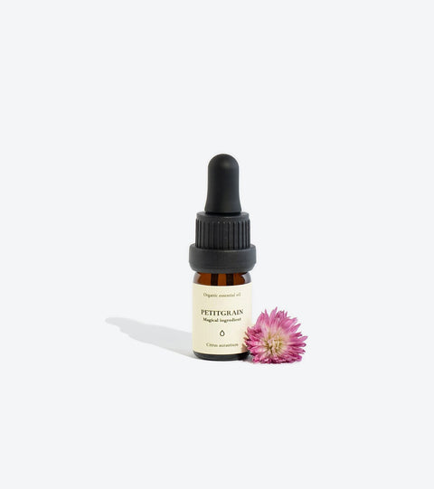2. Smells Like Spells PETITGRAIN Essential Oil 5 ml bottle with pink flower, highlighting organic ingredients