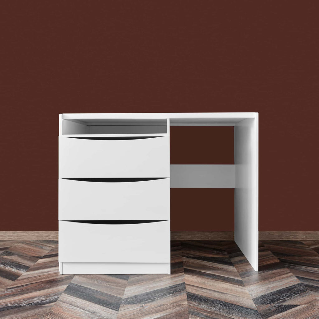 5. Compact white desk with attached chest of drawers on dark wood floor and brown background