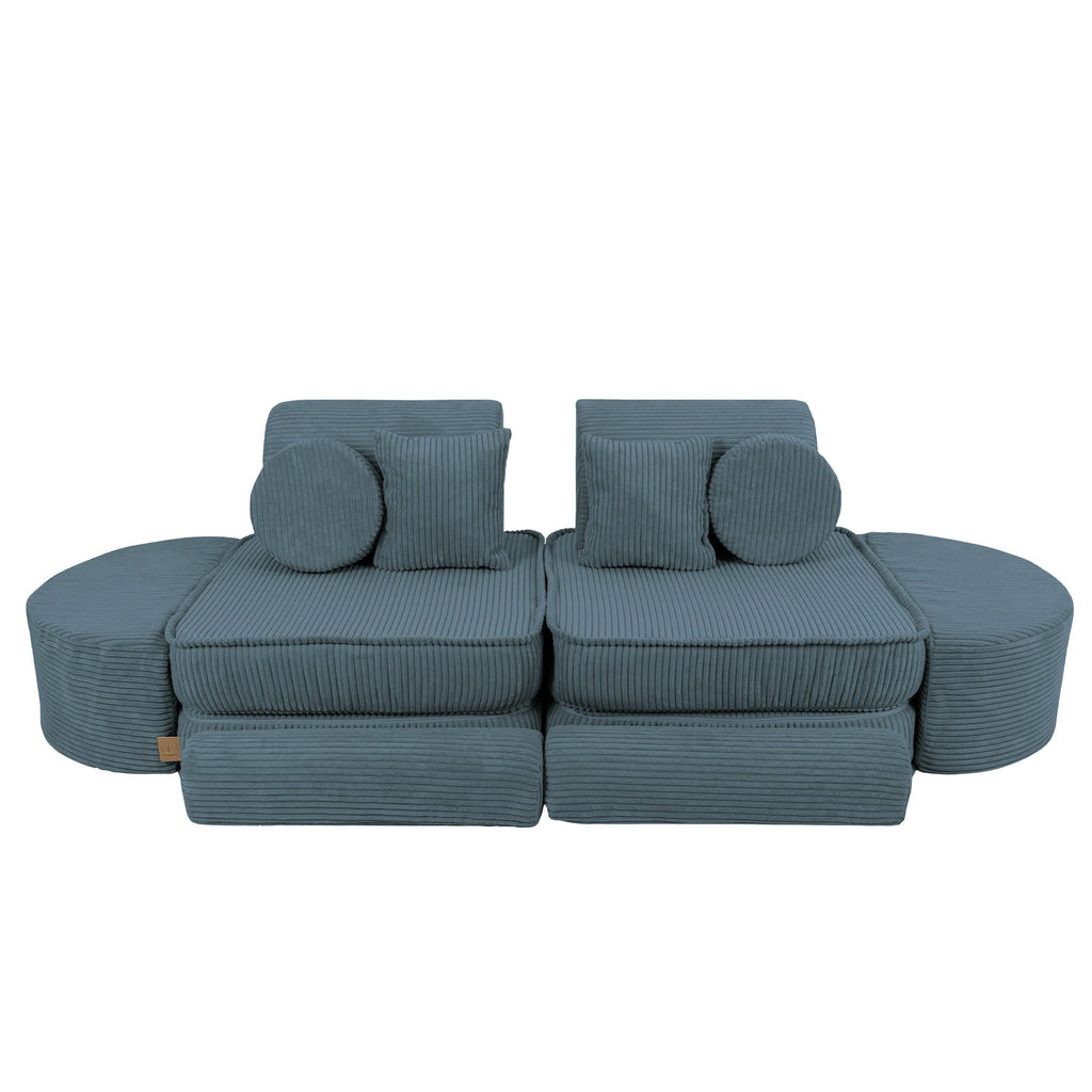 2. Medium modular children's sofa in aesthetic turquoise with ribbed texture, featuring two backrests and circular cushions, shown in a studio setting