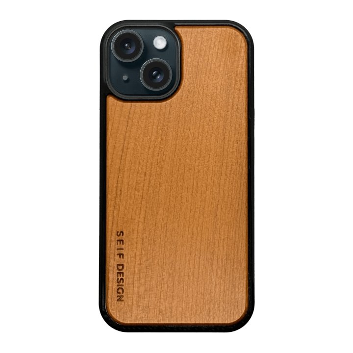 2. Wooden iPhone cover in oak by Seif Design with precision cutouts for camera and buttons, featuring engraved brand logo, shown on black background