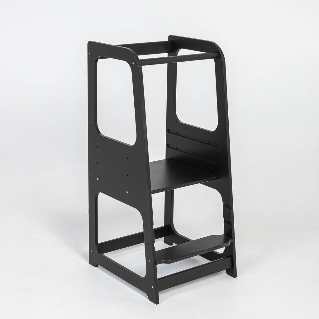 11. Black Montessori helper tower step stool on white background
