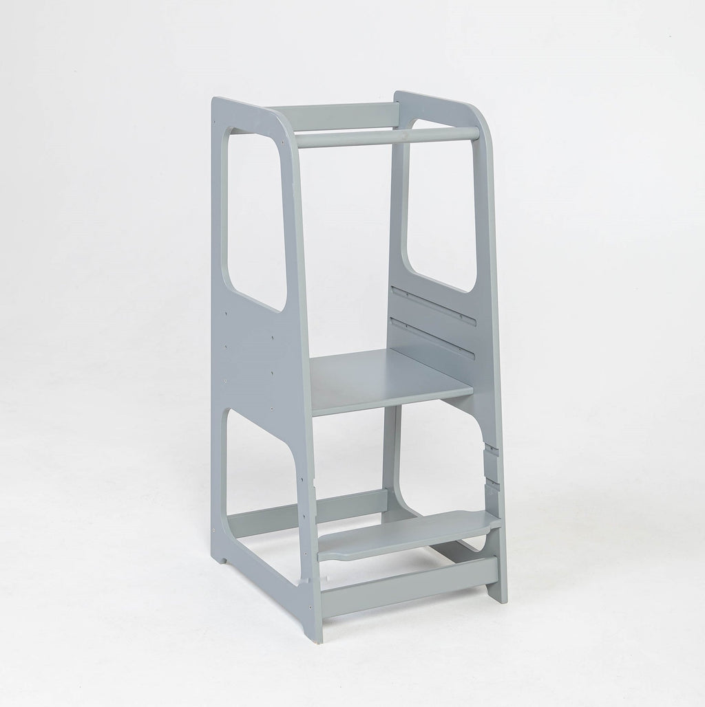 13. Grey Montessori helper tower step stool on white background
