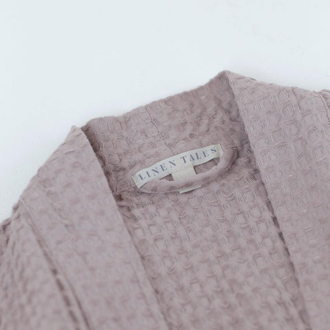3. Close-up of Linen Tales label on powder-colored honeycomb waffle fabric of bathrobe
