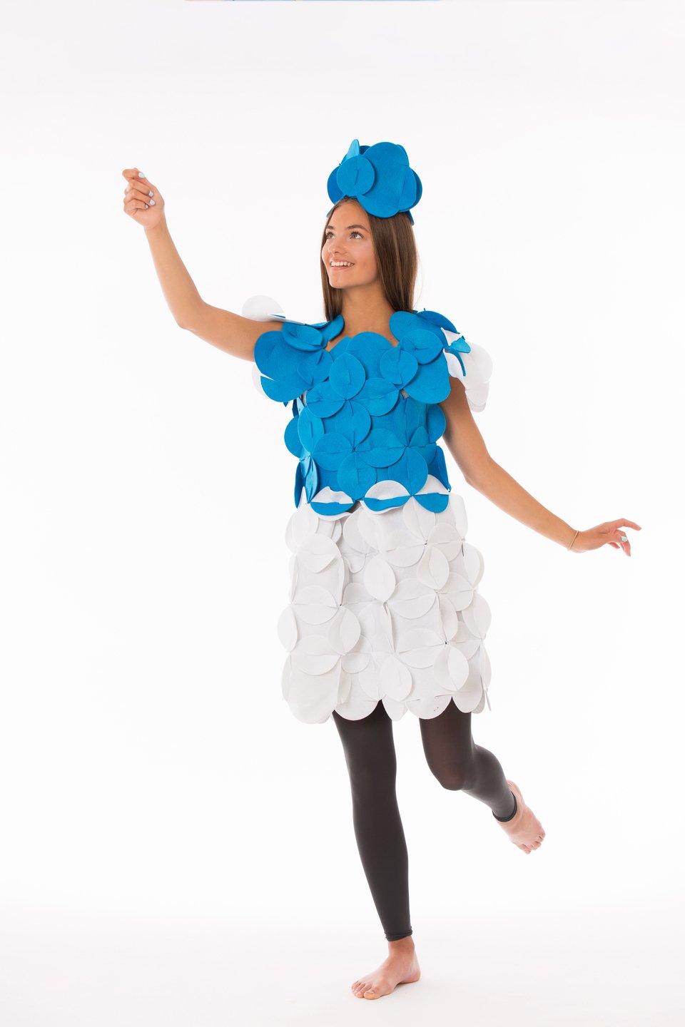 2. Woman in blue and white felt costume posing with one leg raised on white background