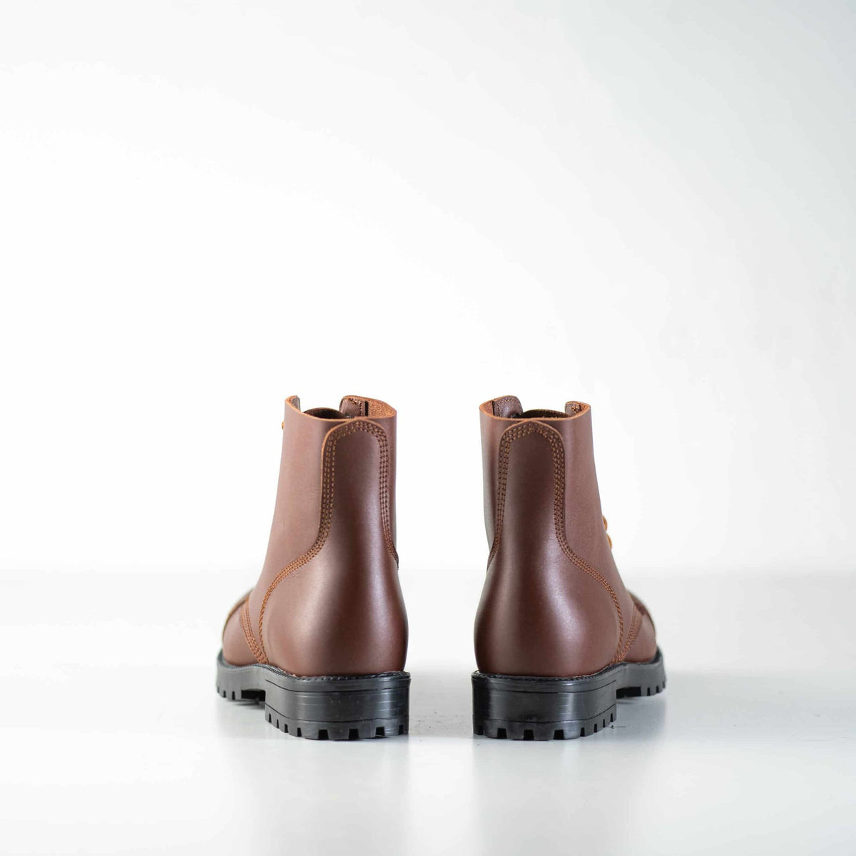 3. Back view of unisex brown Samelin 517 Aviator Boots showcasing sturdy construction