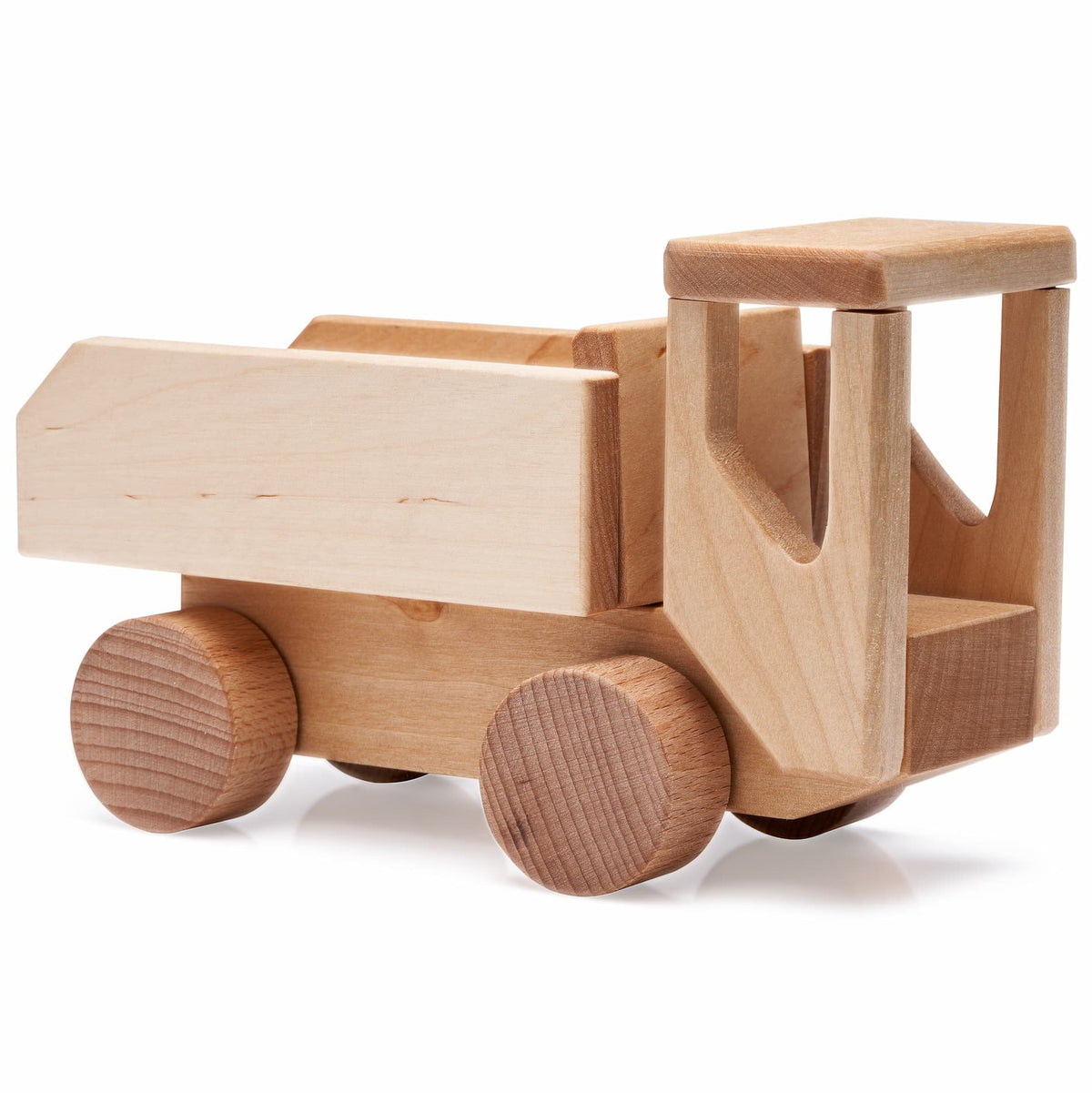 2. Studio shot of Adensen Villi DIY wooden truck made from birchwood, showcasing its natural finish and simple design