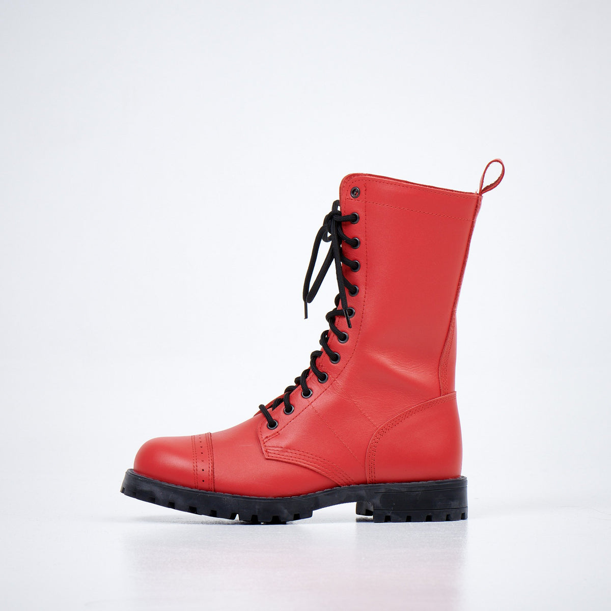 3. Side view of unisex red Samelin 516 High Aviator Boots in studio, featuring lace-up design and durable outsole