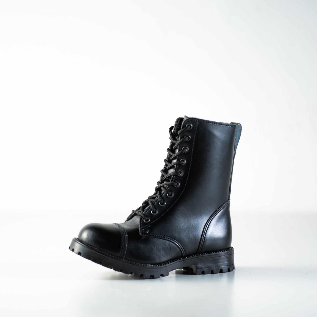 1. Unisex black 511 Winter boots by Samelin in studio, showcasing water-repellent leather and punk-style design