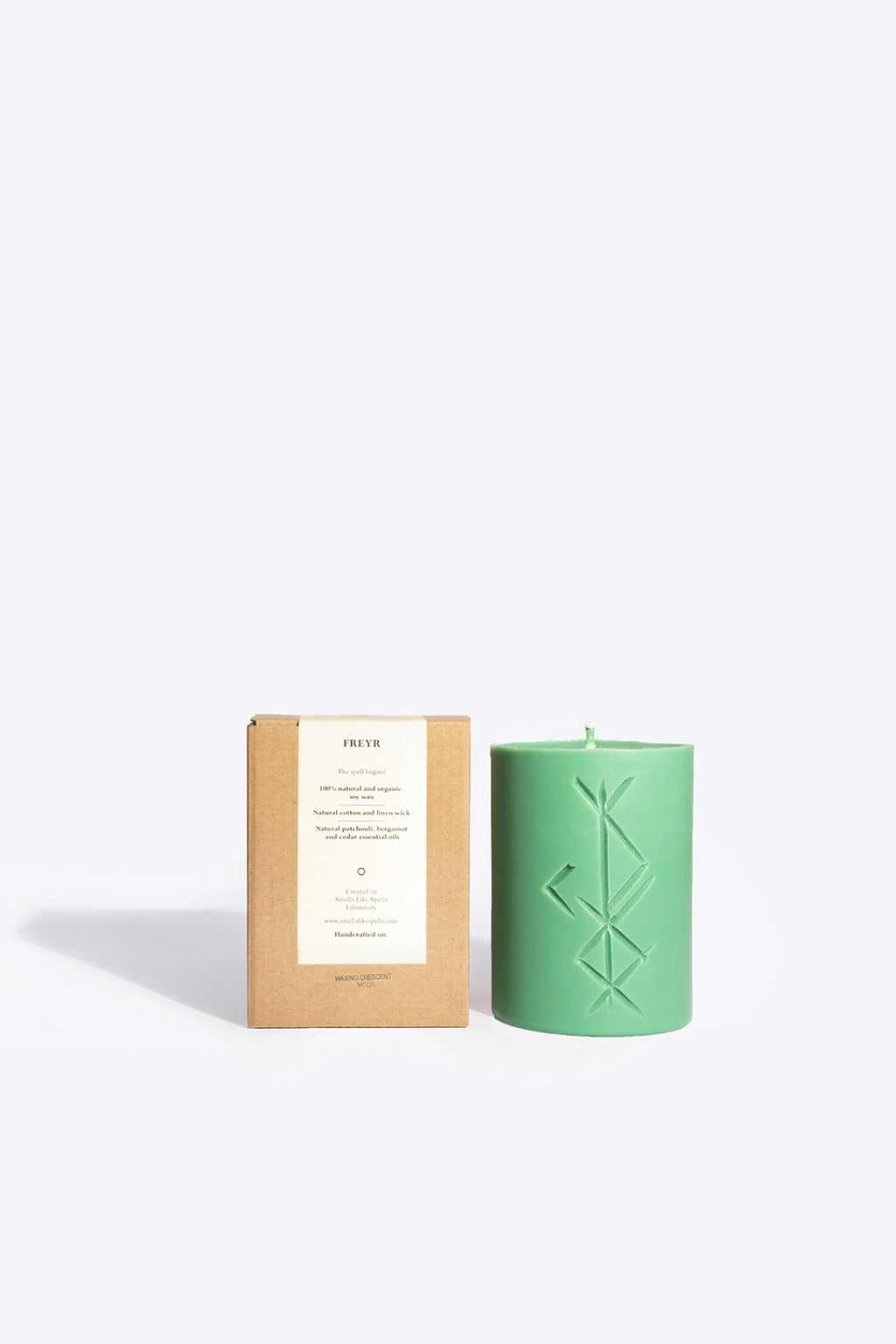 1. Smells Like Spells Rune candle FREYR in green with packaging, showcasing mystical design and soy wax material