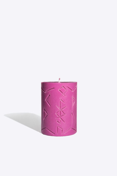 2. Studio image of purple Rune Candle MIMIR by Smells Like Spells with carved symbols