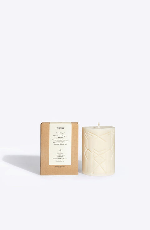 2. Smells Like Spells Rune Candle NORNS with packaging, highlighting natural materials and runic design