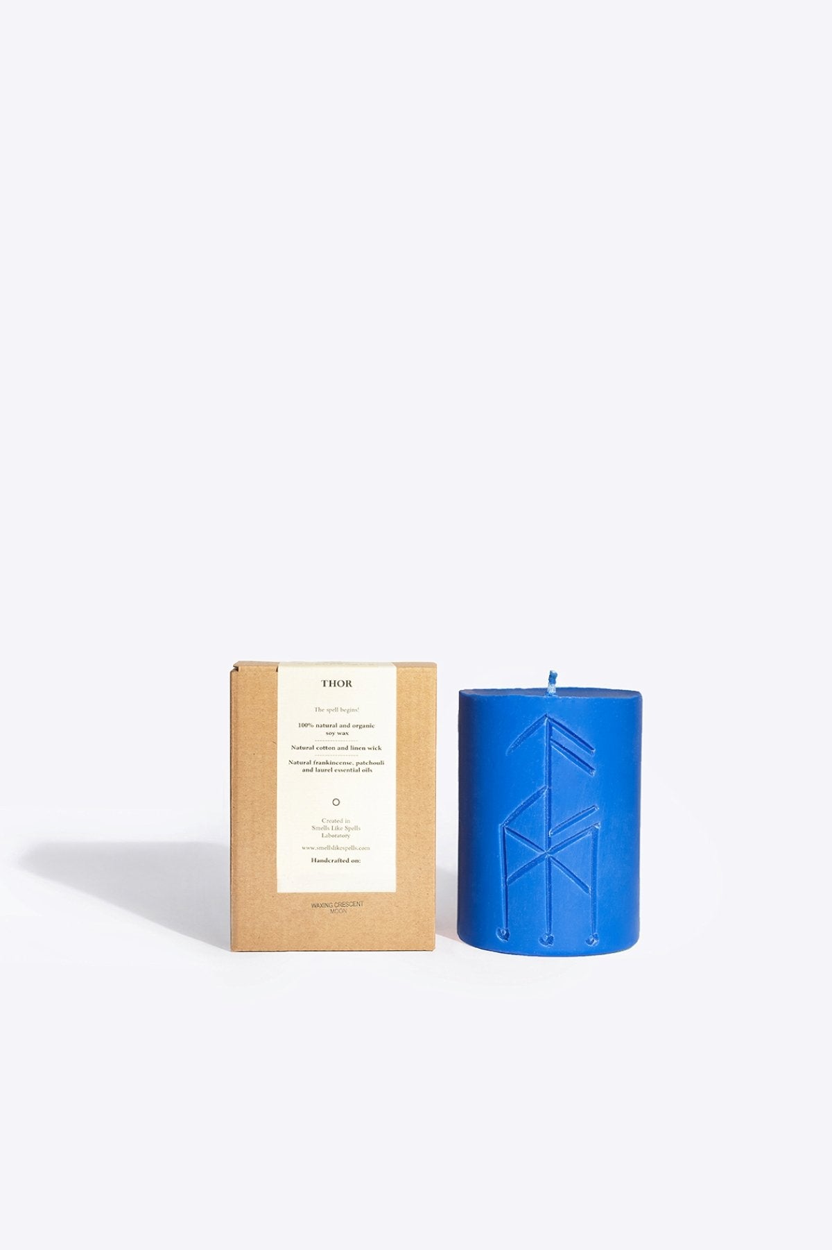 1. Smells Like Spells Rune candle THOR in blue with packaging, showcasing handcrafted soy wax and mystical design