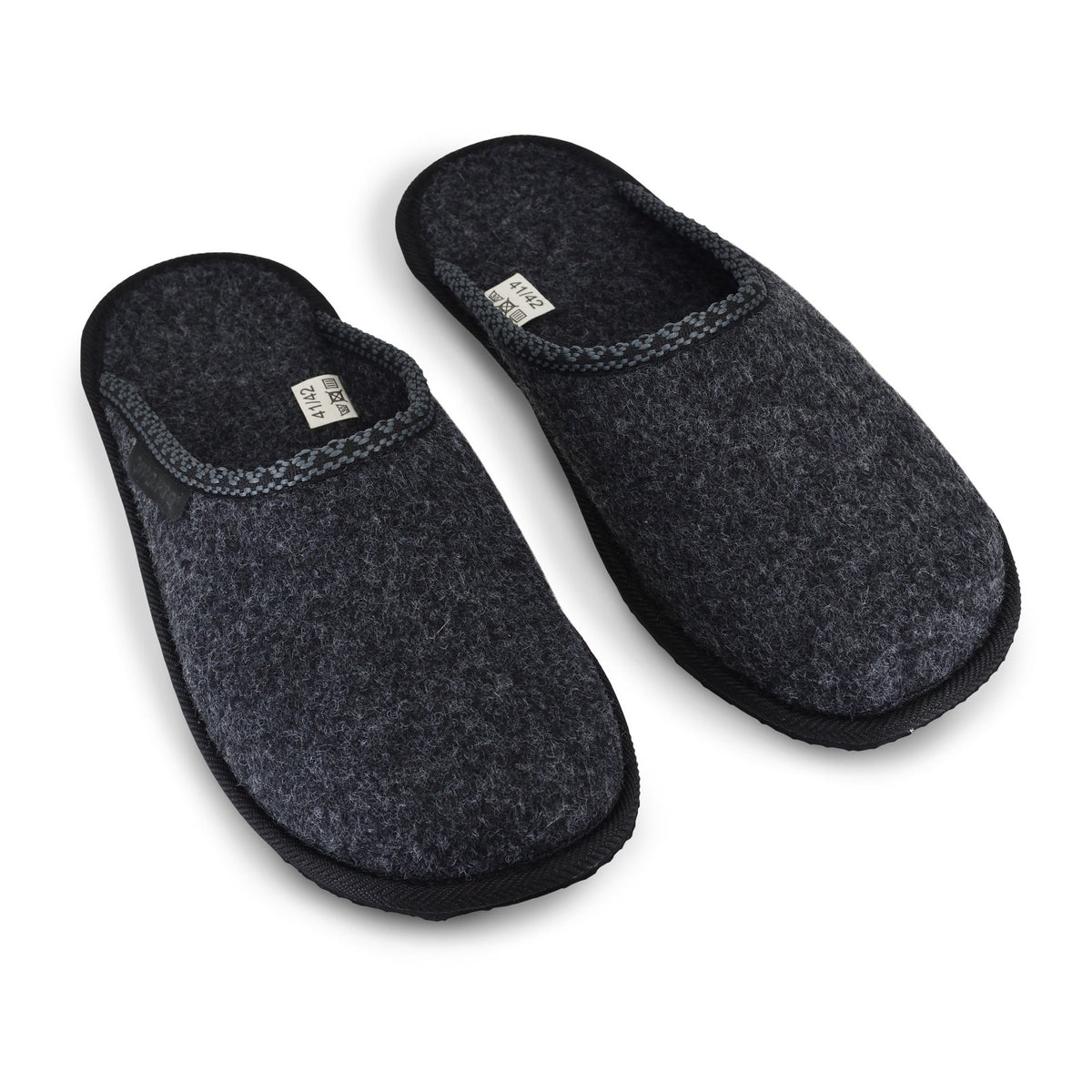 3. Omaking Natural Felt Slippers Mustja in dark grey, angled view of pair showing slip-on design and felt texture