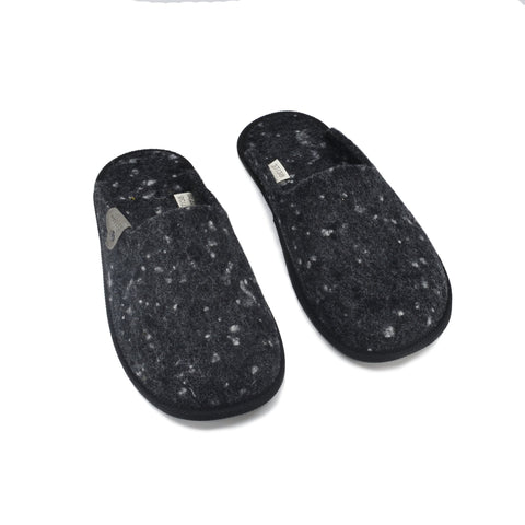 4. Studio image of Omaking dark grey felt slippers with visible brand label