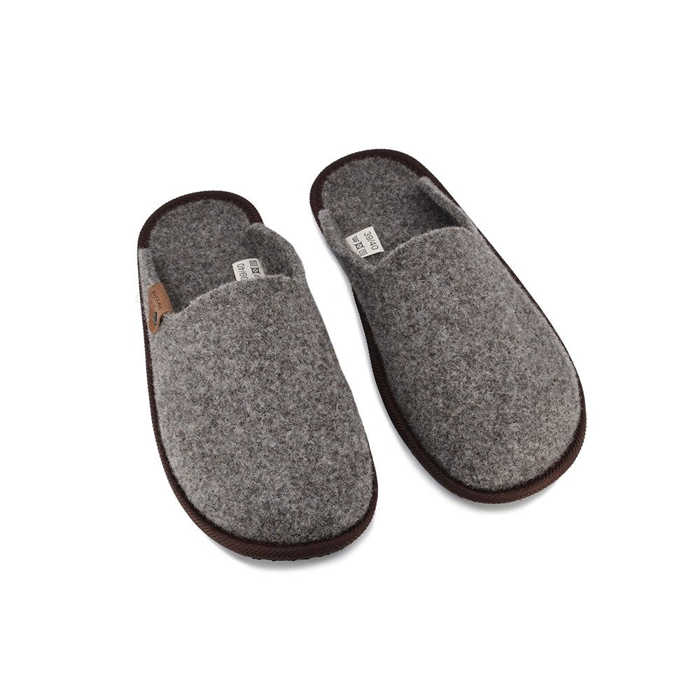 3. Studio image of Nursi unisex slippers by Omaking in grey felted wool