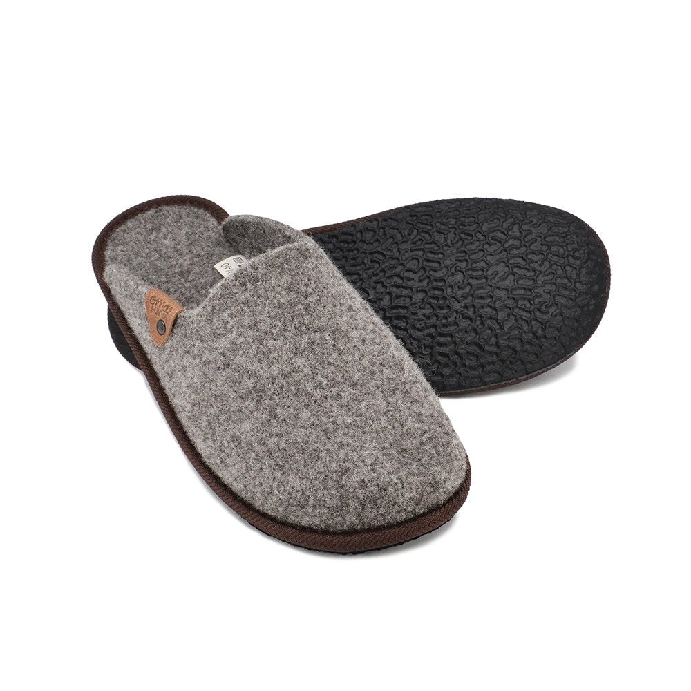4. Studio shot of Nursi unisex slippers by Omaking, showing durable EVA rubber outsole