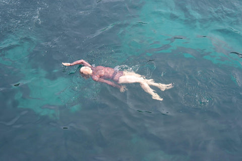 2. Close-up of Smarttan's Tan-Through Mini Leggings in Blue Mandala, highlighting the intricate mandala pattern and stretchy fabric