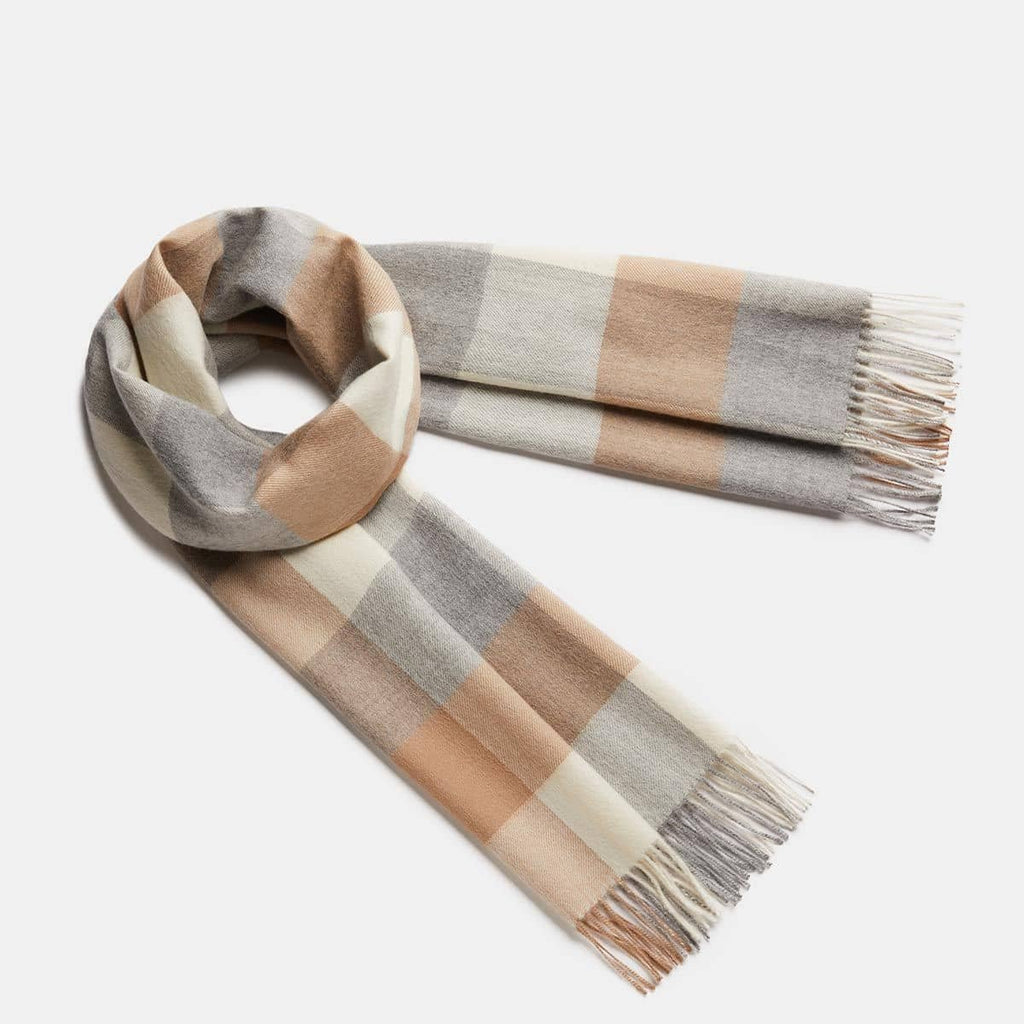 2. Women's natural baby alpaca wool check scarf in gold and grey, shown in studio setting
