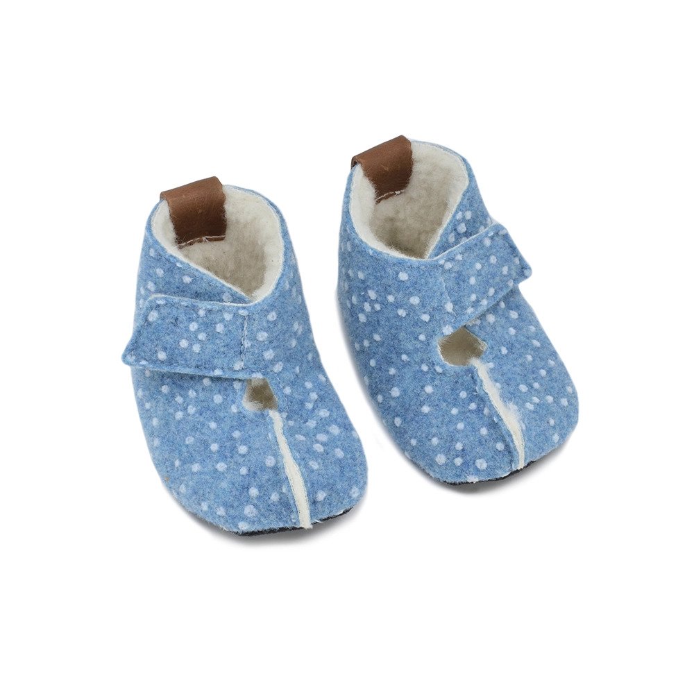 2. Pair of KAKU children's blue slippers with white dots, showing adjustable velcro straps and wool lining