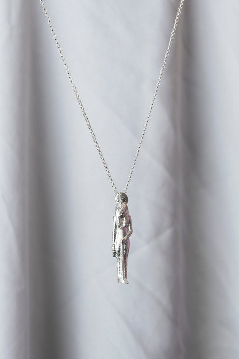 1. Sekhmet Fire Necklace in silver by New Vintage by Kriss, shown hanging against a soft background